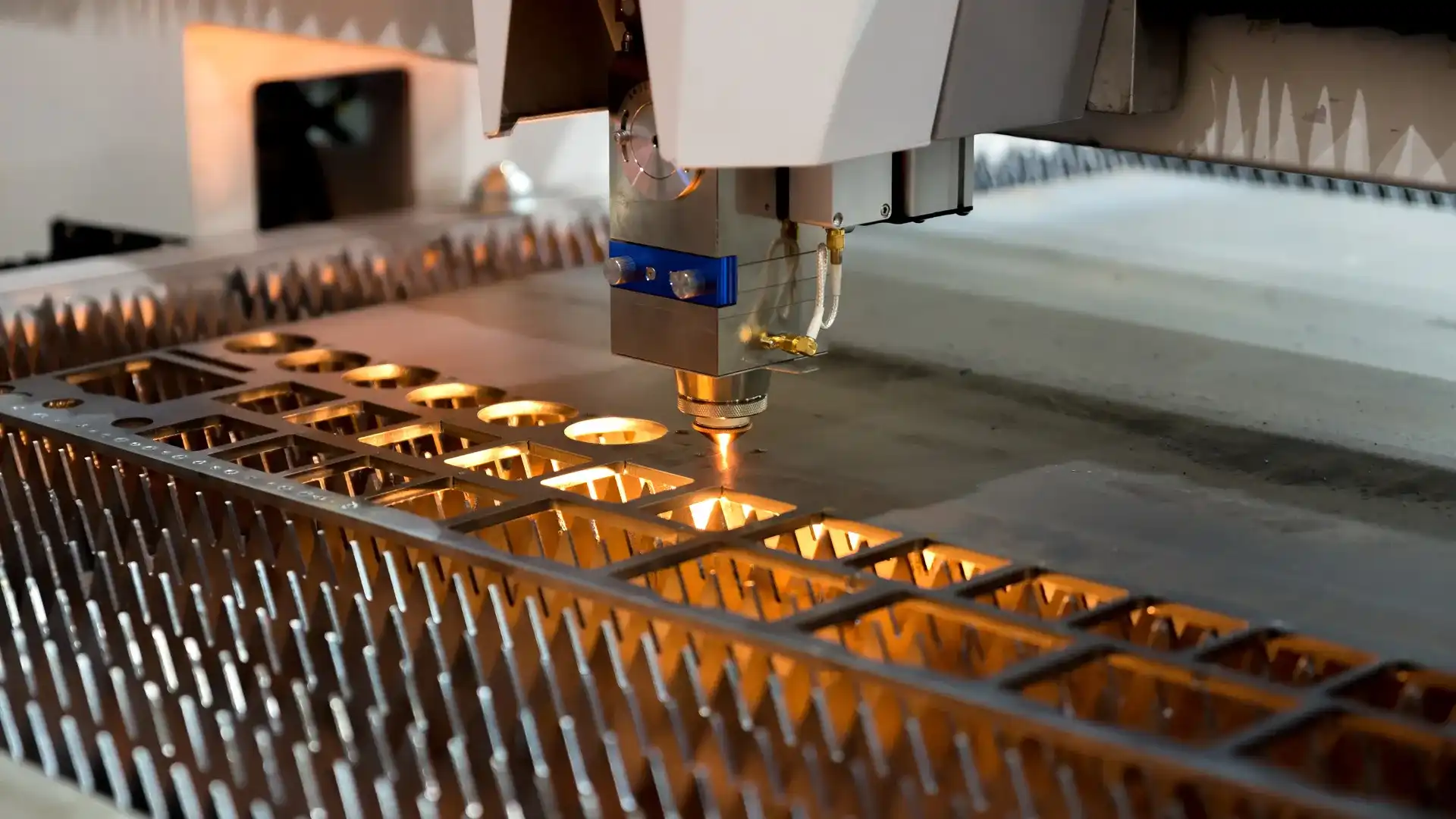 IntelliCut fiber laser cutting a metal sheet