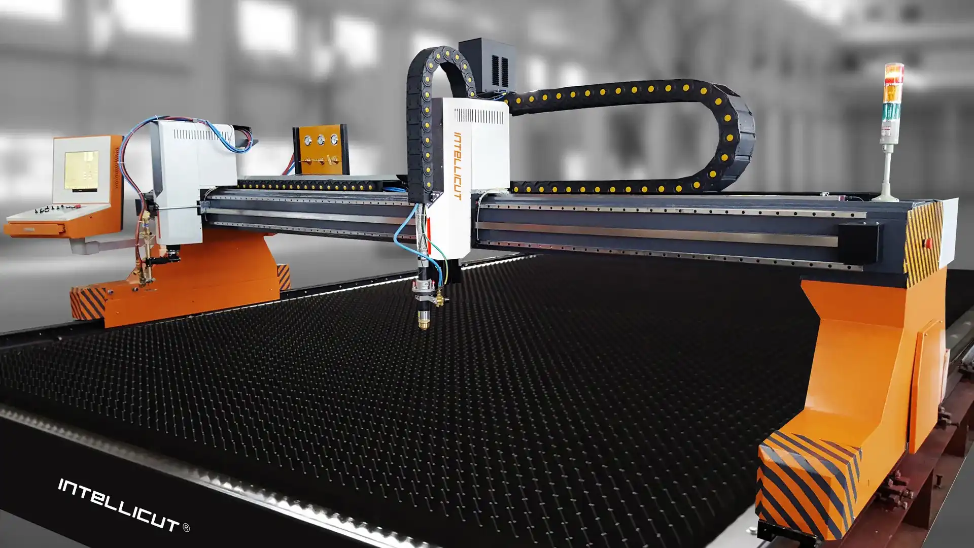 IntelliCut CNC plasma gantry system with orange frame